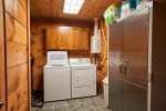 This laundry room makes keeping up with the cleaning chores easy and efficient.